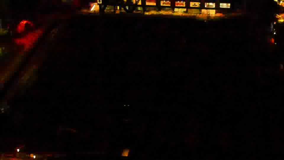 Construction camera frame at 7:00 PM PT. Visibility is too low to assess construction activity.